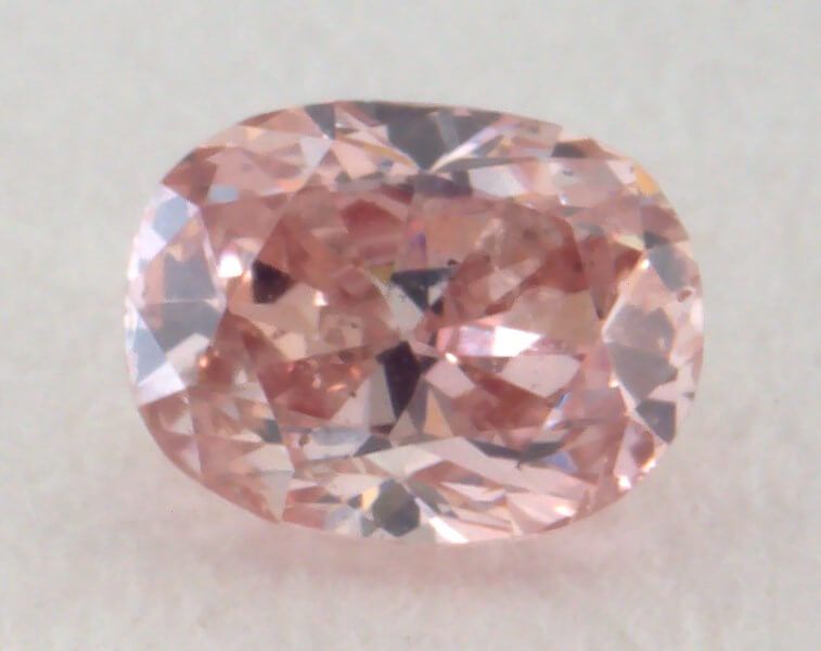 0.13 Carat, Natural Fancy Intense Brownish Pink Diamond, SI1 Clarity, Oval Shape, IGI